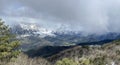 Tseylomsky pass in Ingushetia. A trip uphill to the Tsei Loam pass on a cloudy spring day. Panorama of the high cliffs