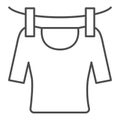 Tshirt on rope thin line icon. Drying tshirt vector illustration isolated on white. Laundry outline style design