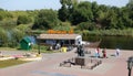 Tsna embankment in Tambov. people at the monument to Peter and Fevronia