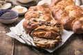 Tsoureki braid, greek easter sweet bread, on wood