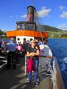 Passengers on deck of vintage steamship