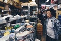 Tsukiji, Tokyo, Japan - October 5, 2020 : one senior japanese woman and many tourists are shopping ceramic dishware in