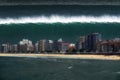 Tsunami breaking on city coast