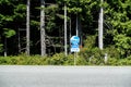 A tsunami evacuation route sign along a road on Vancouver Island