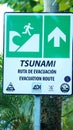 Tsunami evacuation route sign on the beach