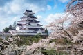 Tsuruga Castle surrounded by hundreds of sakura trees Royalty Free Stock Photo