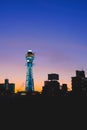 Tsutenkaku Tower with Silhouette city foreground