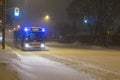 TTC bus driving on Bloor street, Toronto, during snow storm. Royalty Free Stock Photo