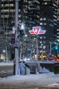 A TTC sign at a subway stop covered in snow and ice during a winter storm Royalty Free Stock Photo