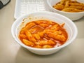 Tteok-bokki, or stir-fried rice cakes - Popular Korean street food made from small-sized rice cakes. Royalty Free Stock Photo