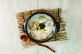 tteok mandu guk, Korean style dumpling soup with sliced rice cake Royalty Free Stock Photo