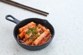 Tteokbokki or Topokki , stir fried rice cake stick, popular Korean street food Royalty Free Stock Photo