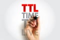 TTL Time To Live text with a hand writing, concept of data packet lifespan and network communication parameter Royalty Free Stock Photo