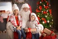 Little children and authentic Santa Claus Royalty Free Stock Photo