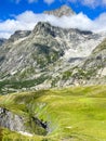 Tour de Mont Blanc hike with view along Dora di Ferret near Tete de Ferret