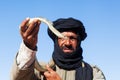 Tuareg man with a snake Royalty Free Stock Photo