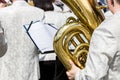 Tuba player at brass band during open air concert Royalty Free Stock Photo