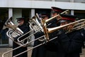 A tuba player and a trombonist in the Salvation Army brass band. Royalty Free Stock Photo