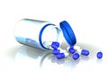 Tube of blue capsules overturned Royalty Free Stock Photo