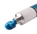 Tube with blue oil paint on white background Royalty Free Stock Photo