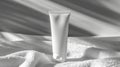 tube of body cream sitting inside of a white towel, in the style of wetcore,