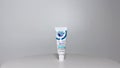 A tube of Crest ProHealth Gum Detoxify toothpaste on a white background