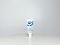 A tube of Crest ProHealth Gum Detoxify toothpaste on a white background