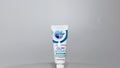 A tube of Crest ProHealth Gum Detoxify toothpaste on a white background