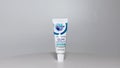 A tube of Crest ProHealth Gum Detoxify toothpaste on a white background