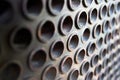 Tube sheet or plate of boiler or heat exchanger selective focus shot at an angle closeup texture industrial background