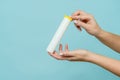 Tube for vitamins, pills in hand. Packaging. Mockup Royalty Free Stock Photo