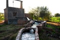 Tube well and temporary water reservoir in a small village of Pakistan Royalty Free Stock Photo