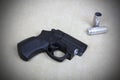 Tubeless doubly charged traumatic pistol. Image with vignette