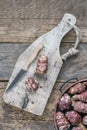 Raw Jerusalem artichoke vegetables on wooden cutting board to preparing food Royalty Free Stock Photo