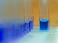 Tubes with blue liquid on test tube rack Royalty Free Stock Photo