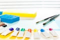 Tubes of paint laying on a table during art lesson Royalty Free Stock Photo