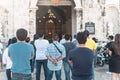 Tubigon, Bohol, Philippines - Local churchgoers attend a packed sunday mass outside the church Royalty Free Stock Photo