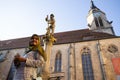 TUBINGEN/GERMANY:JULY 30 2018: A Muslim traveler woman looks happy, walking on the sidewalks of the city of Tubingen near the St. Royalty Free Stock Photo