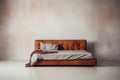 Tucked in twin bed isolated against a grunge wall backdrop Royalty Free Stock Photo