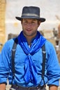 A young cowboy is a professional pastoralist or mounted livestock herder Royalty Free Stock Photo