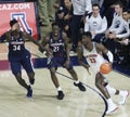 Arizona Forward Deandre Ayton Seeks to Evade Two UConn Defenders Royalty Free Stock Photo