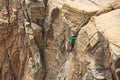 Man Top Rock Climbing a Hoodoo in Arizona Royalty Free Stock Photo