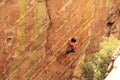 Woman Lead Rock Climbing a Hoodoo in Arizona