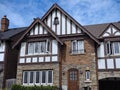 Tudor design home with half timbered decorations and leaded glass windows Royalty Free Stock Photo
