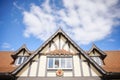 tudors front gable against cloudfilled sky Royalty Free Stock Photo