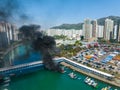 Top view of Hong Kong residential district and fire accident on boat Royalty Free Stock Photo