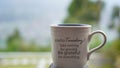 Tuesday cup of tea or coffee on the table with inspirational text message on it - Hello Tuesday. Take nothing for granted. Royalty Free Stock Photo
