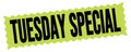 TUESDAY SPECIAL text written on green-black zig-zag stamp