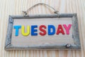 Tuesday word with colorful letter