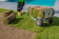 Tuft Grass Rolls Loaded on Hand Truck